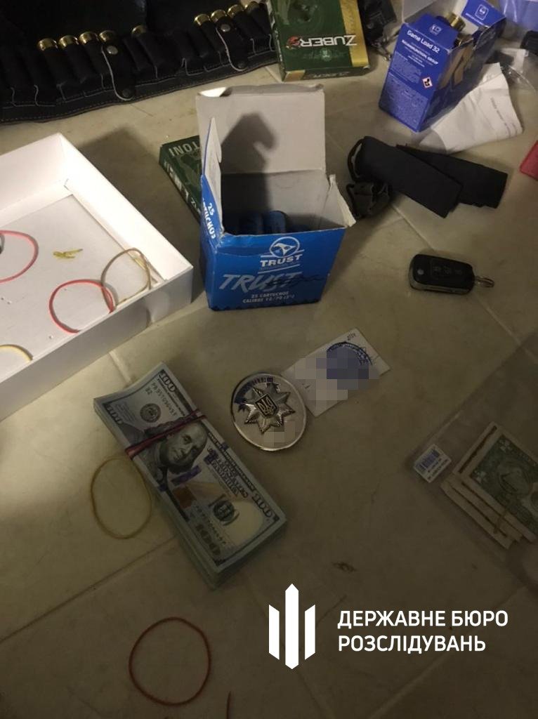 Выдавал разрешения на оружие за деньги: в Харькове чиновника полиции подозревают в получении взяток, - ФОТО, фото-10